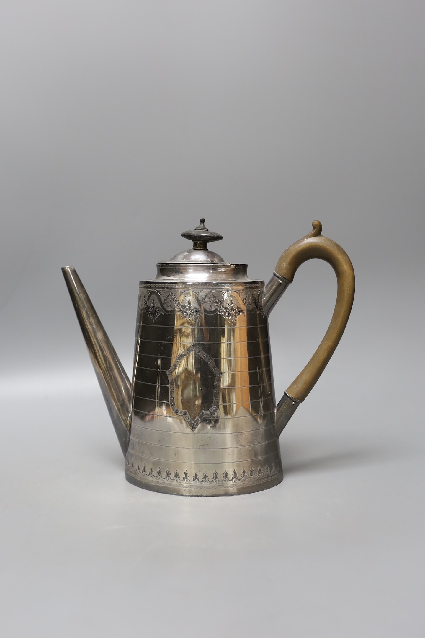 A Victorian engraved silver coffee pot, Fenton Brothers, Sheffield, 1875, height 22.3cm